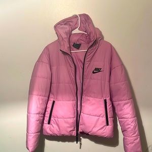 Women’s pink Nike winter coat size Medium. Only worn twice